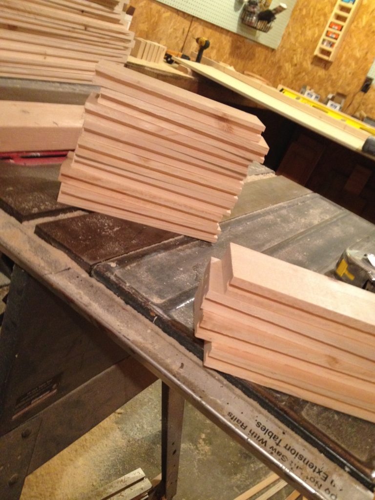 Stacks of shaker cabinet doors frames with dadoes cut for inside panels