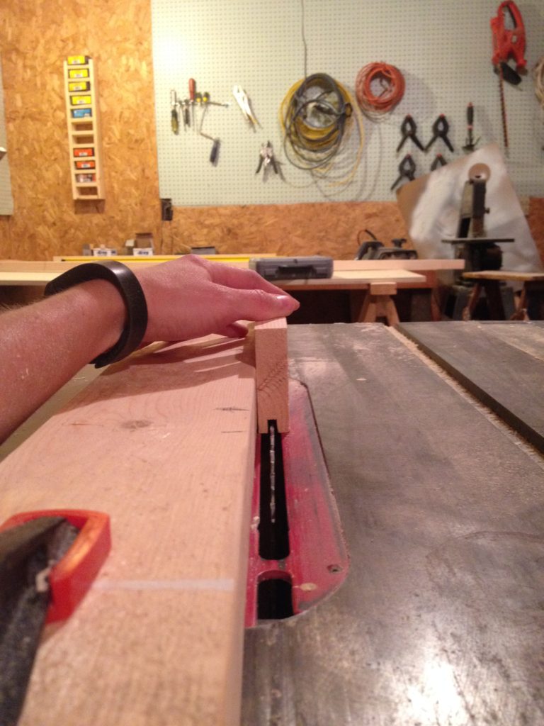 Stop and start marks on table saw rip fence for cutting vertical frame pieces for shaker cabinet doors