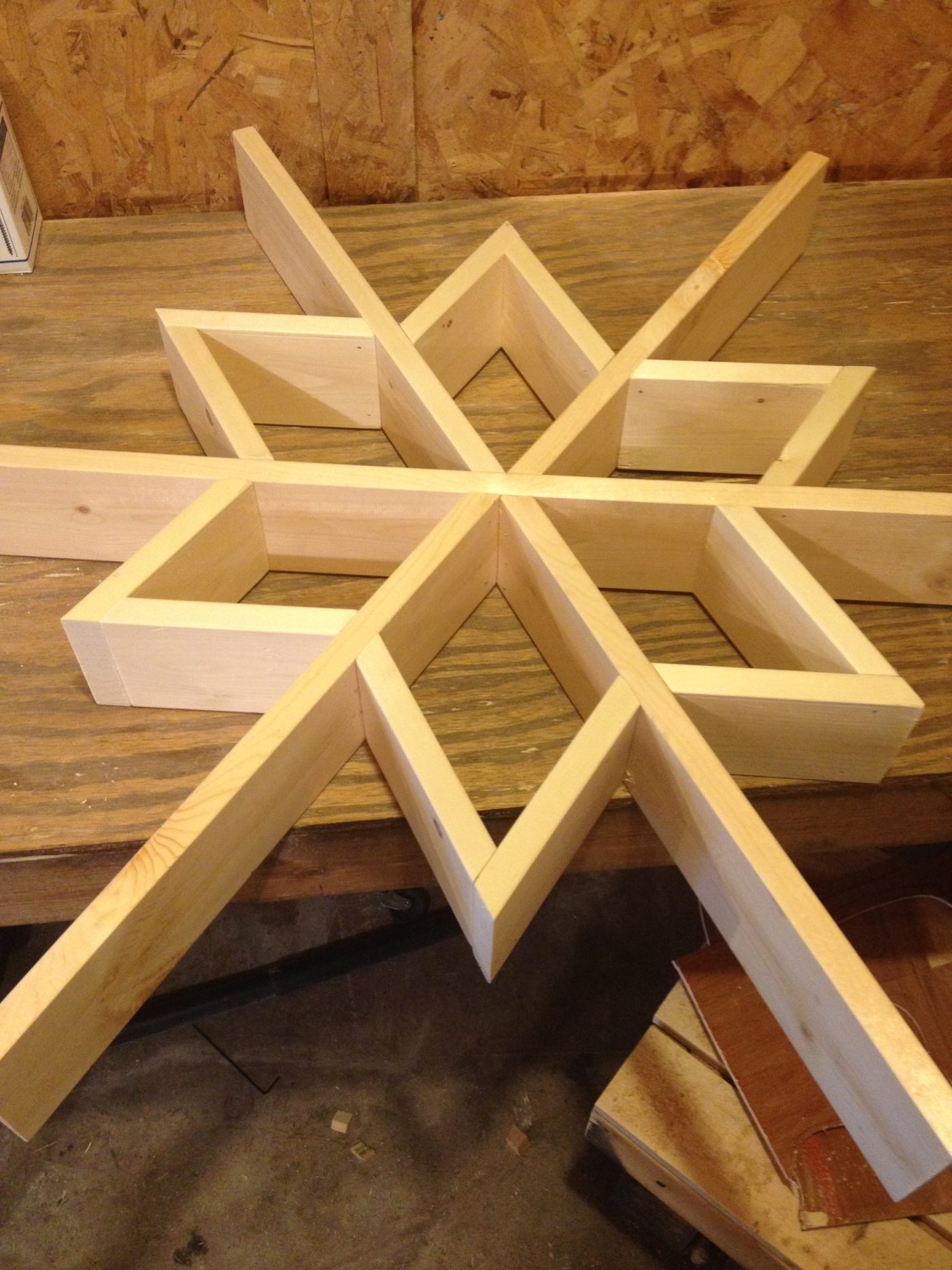 wall shelf assembly in progress--triangles attached to main frame