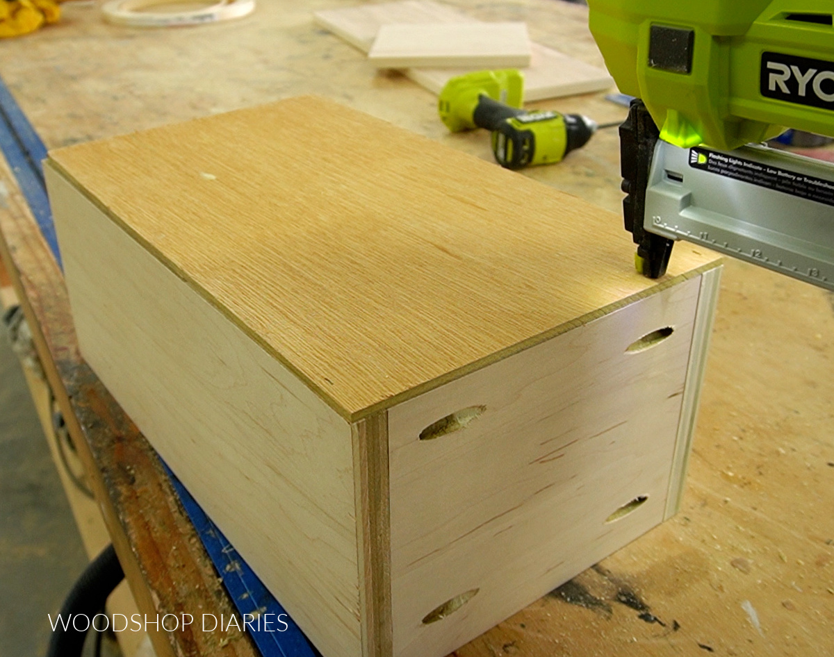 Stapling bottom panel onto drawer box for coffee bar cabinet build