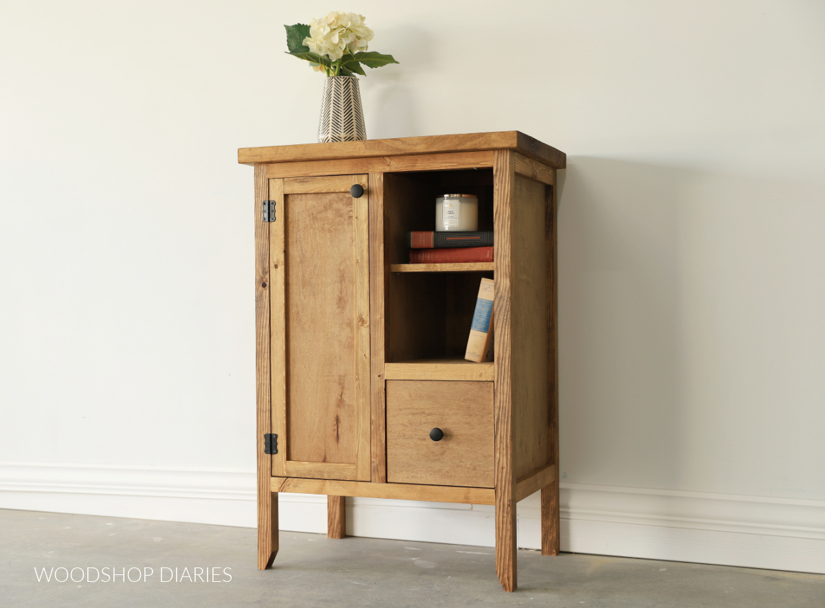 Wooden DIY coffee bar cabinet project made from pine and plywood stained in minwax early american with door and drawer