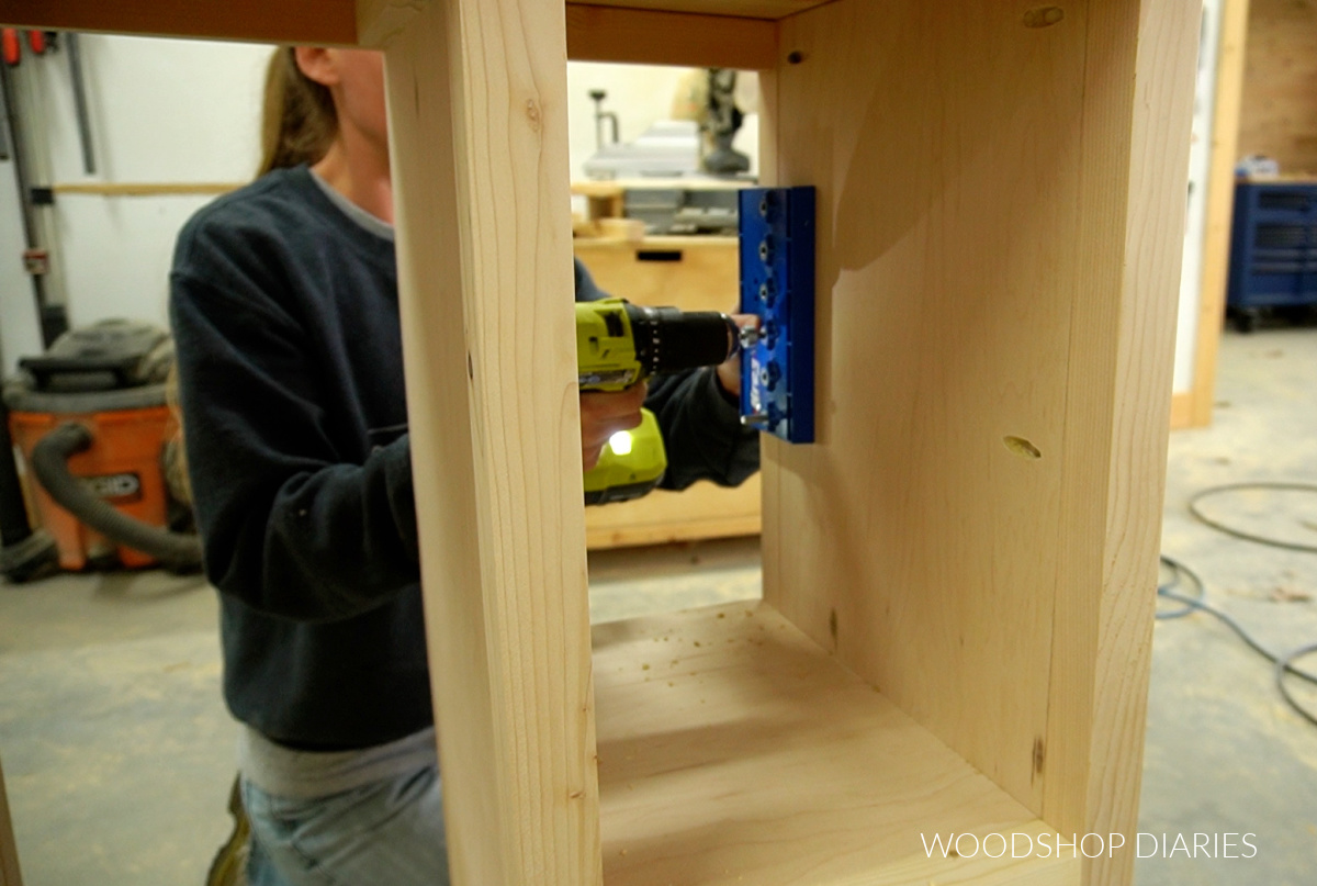 Shara Woodshop Diaries using a shelf pin jig to drill shelf pin holes in cabinet