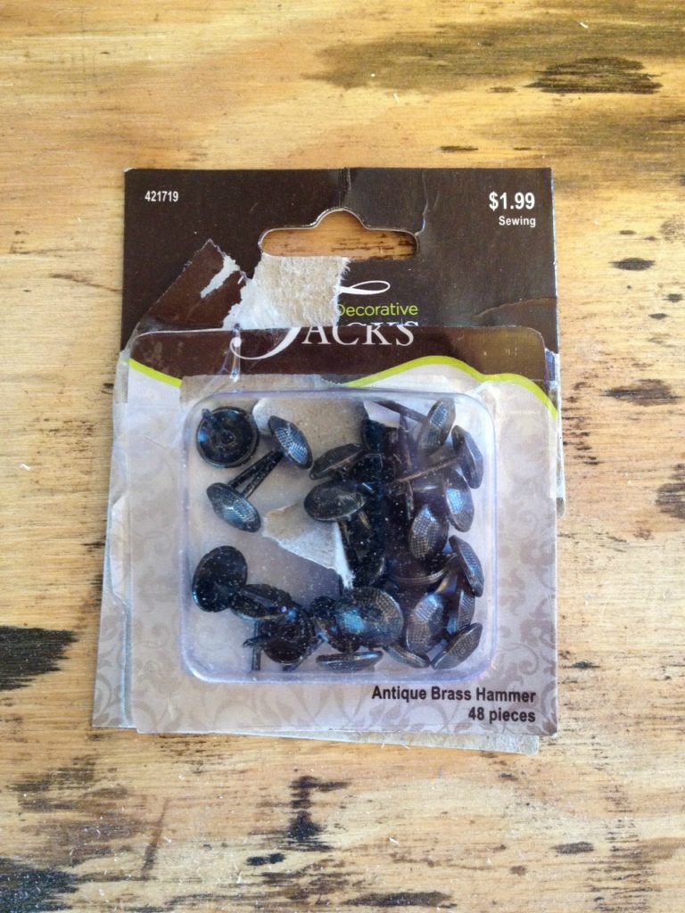 Upholstry tacks in package