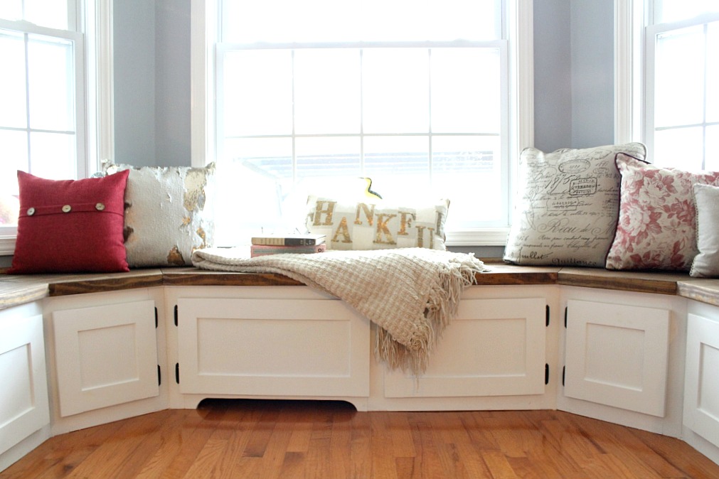 You won't believe the difference these DIY Built Ins had on this breakfast kitchen nook!