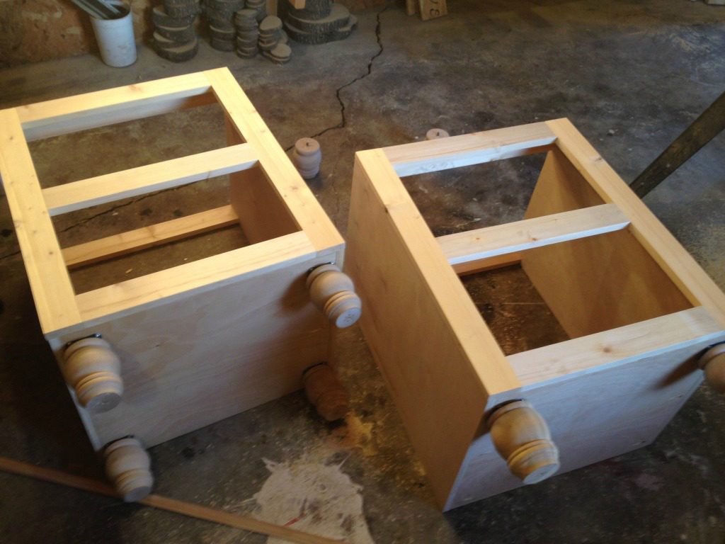 Corner desk side cabinets assembled with face frames attached on front