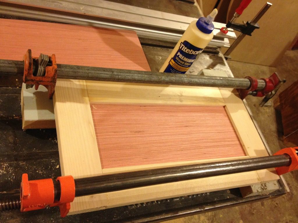 Shaker style drawer front in clamps while glue dries