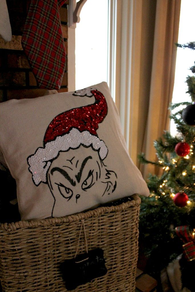 Close up of Grinch Pillow cover with sequins