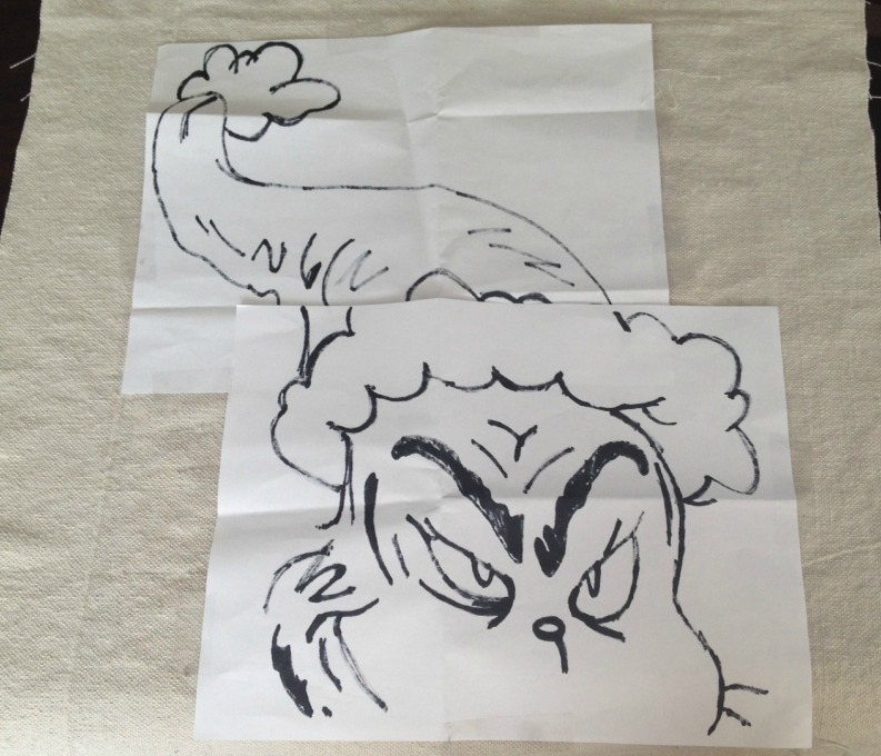 Grinch template on paper upside down on fabric