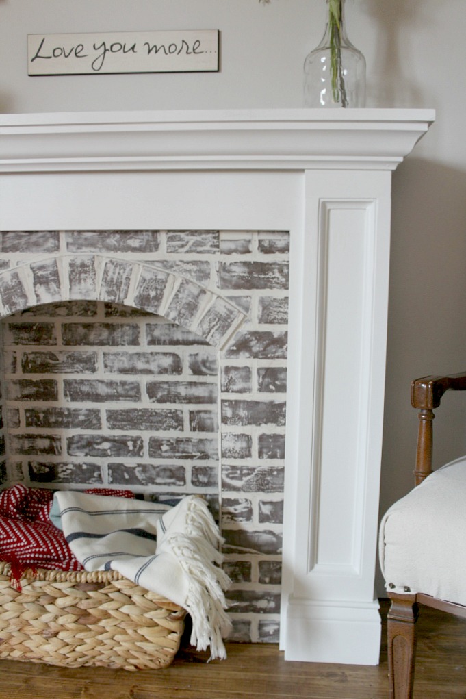 How to DIY a Faux Brick Fireplace and you'll never believe how easy it is!!