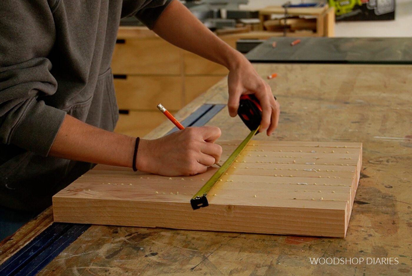 finding center of glued up panel with measuring tape