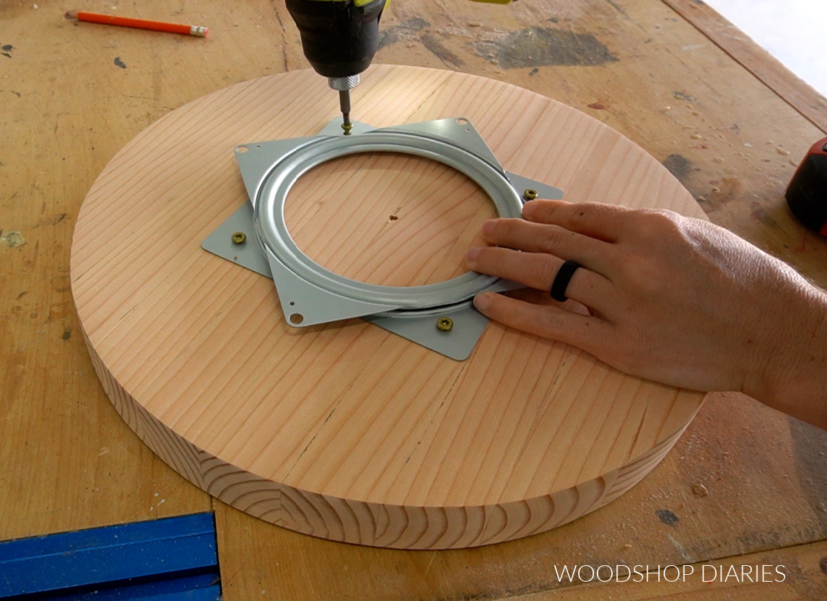 installing lazy susan hardware onto bottom of round wooden circle