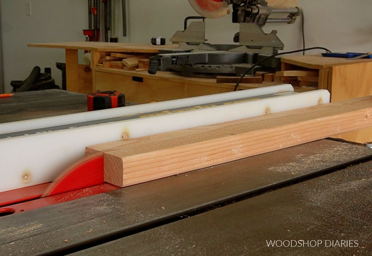 cutting 2x4 board into 2x2 strips on table saw