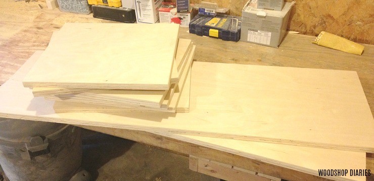 Boards cut stacked and ready to assemble tall linen shelf