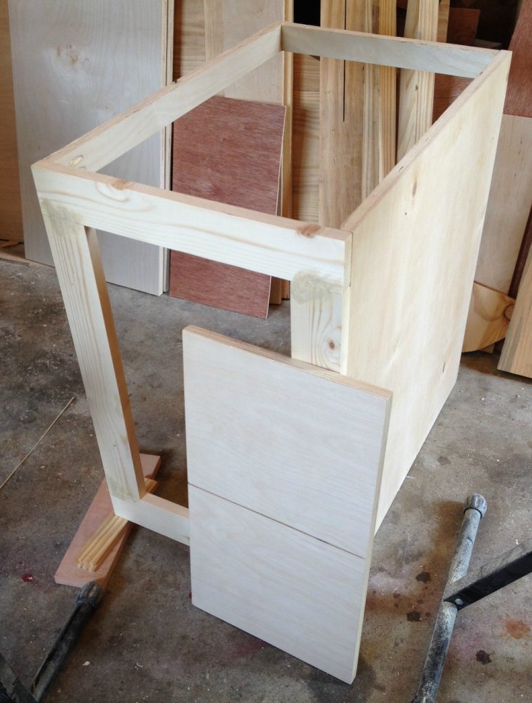 DIY Mudroom built ins--dummy cabinet carcass to cover corner duct