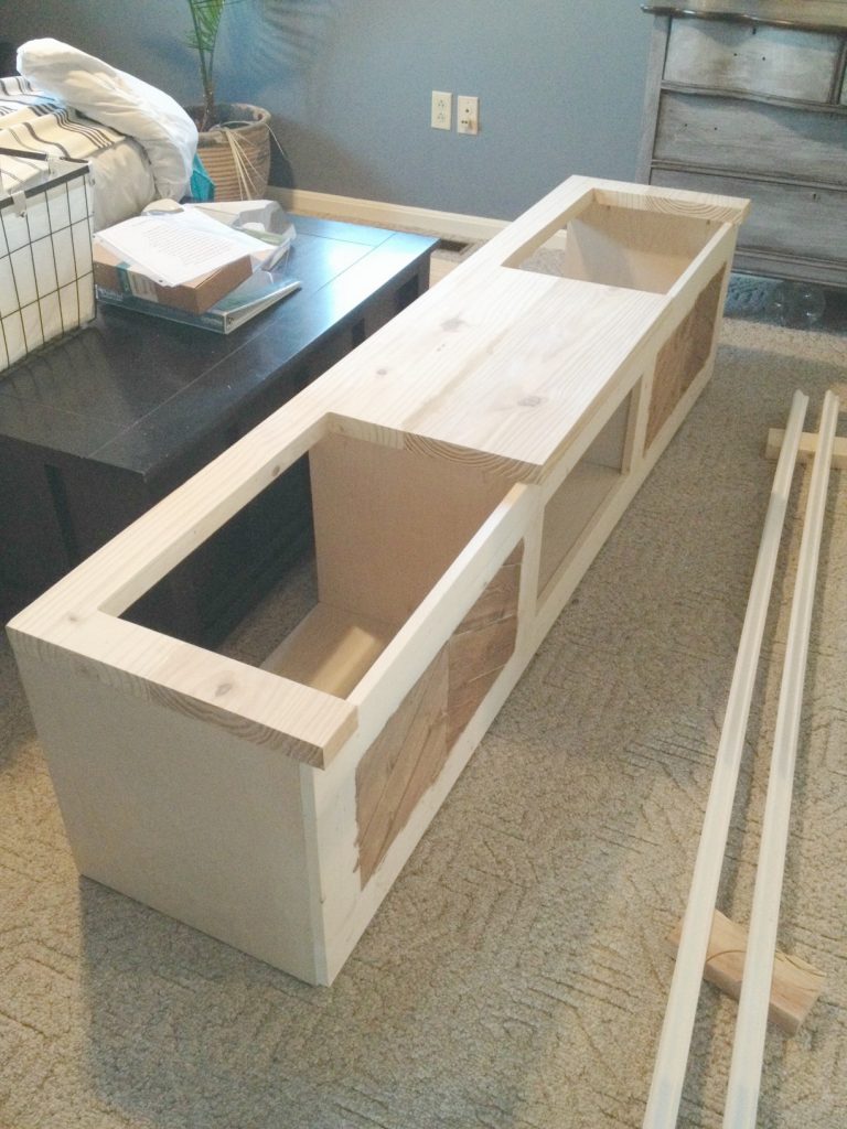 Mudroom shoe bench top with sides cut for flip tops