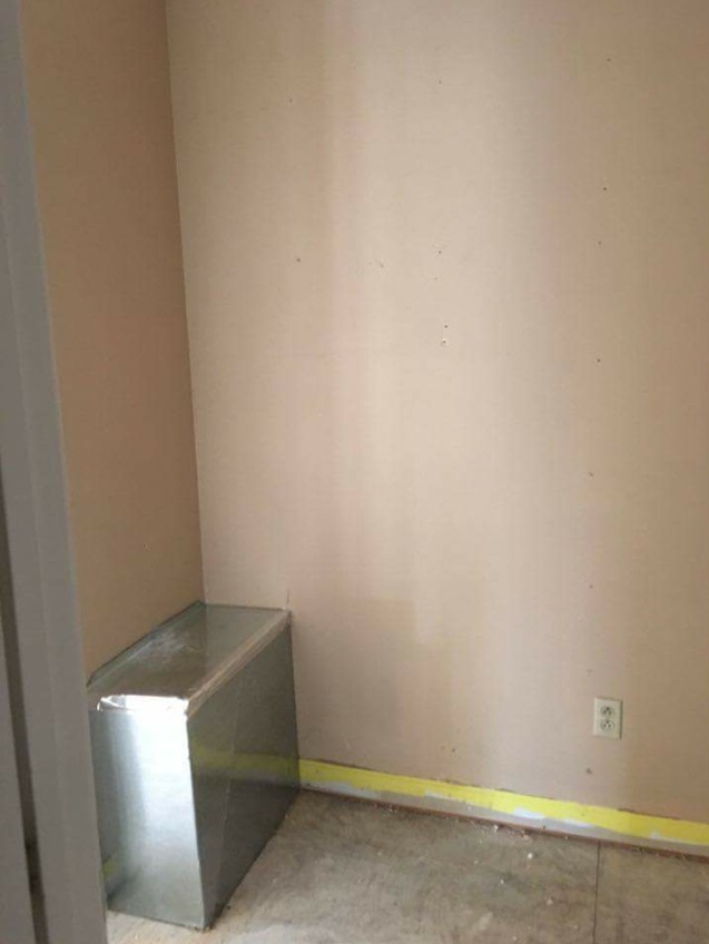 DIY Mudroom Transformation Left side Before with Large Air Duct in corner