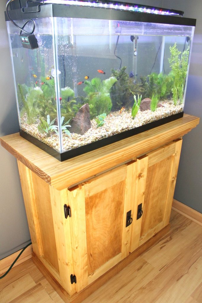 DIY aquarium cabinet stand finished in Golden Oak Wood stain