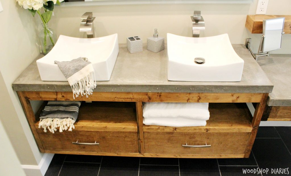 DIY Floating bathroom vanity with concrete countertops and vessel sink. Clean modern style bathroom