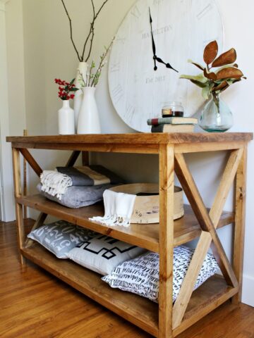 How to build a DIY X base console table with middle shelf for added storage--free building plans!