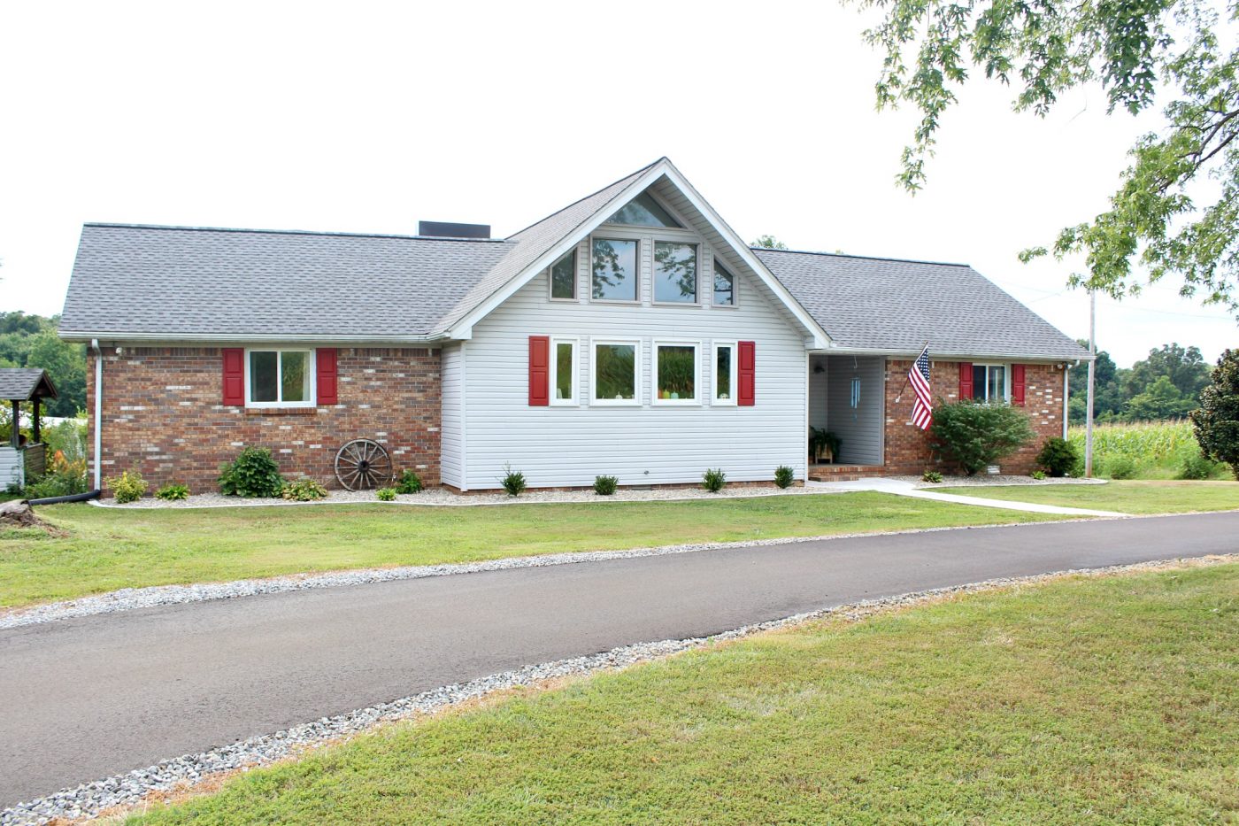 Clean, modern, and simple landscape update with Indiana river rock and concrete edging