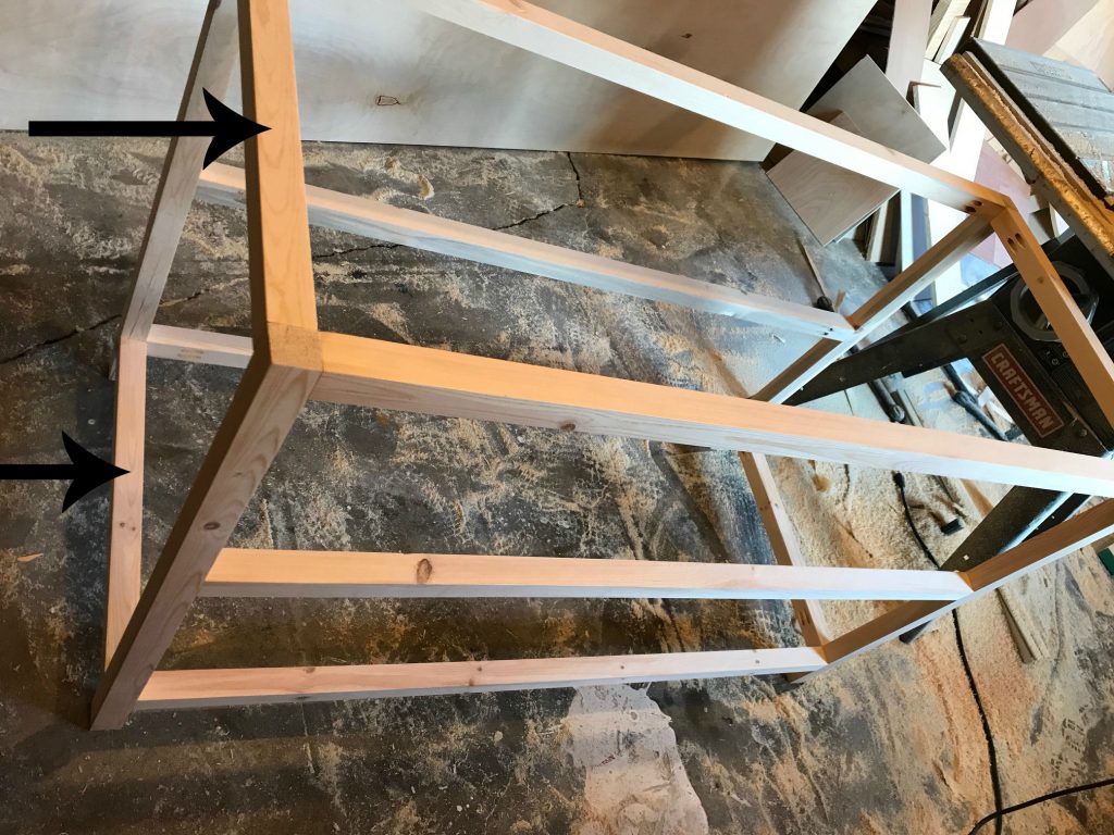 Attach front and back frames of X base console table together
