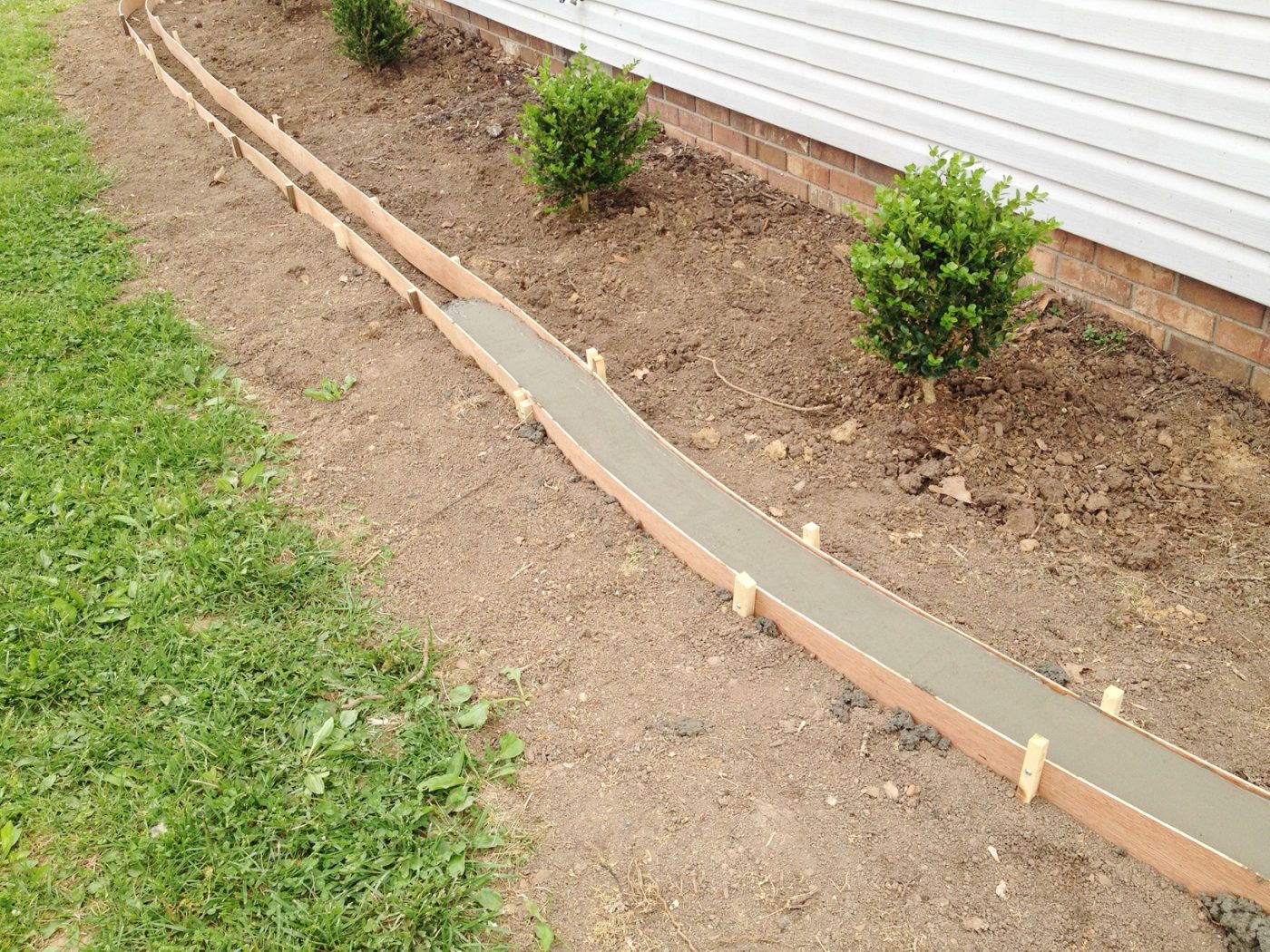 Updating Landscaping by adding a concrete edge