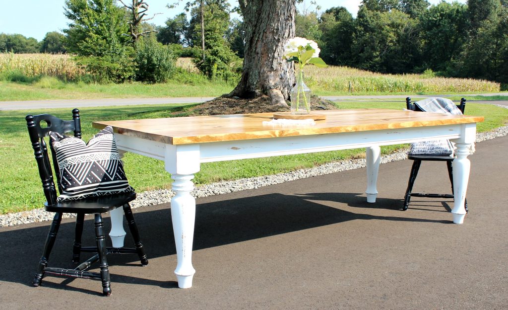 Check out this beautiful distressing on this easy to build DIY Farmhouse Dining Table--get the free building plans here