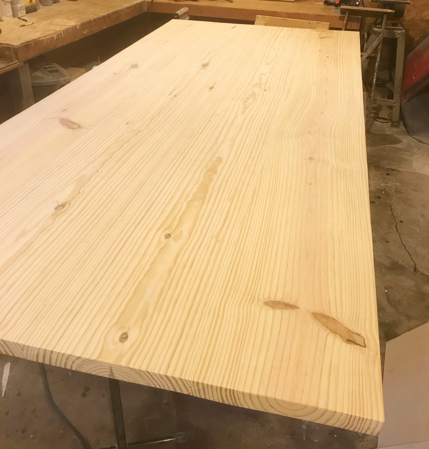 2x12 glued up table top in workshop sanded flat