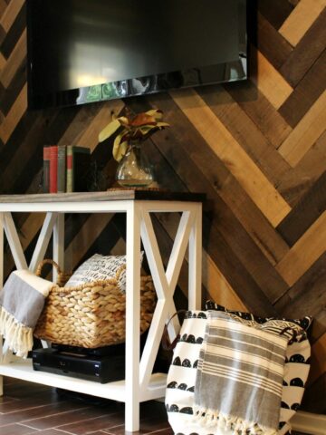 How to install a barn wood wall with herringbone pattern to make a gorgeous accent wall in your living room