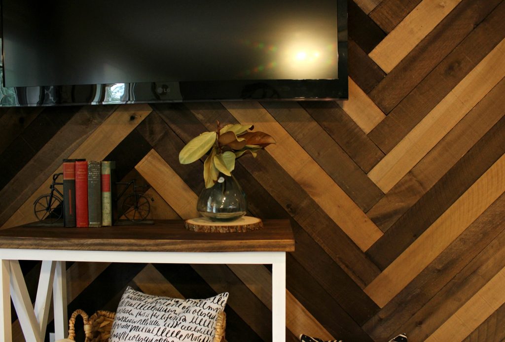 DIY Herringbone Barn Wood Wall--give your wall a rustic feel with these weathered wall boards