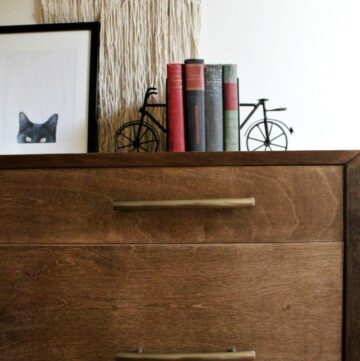 How to build a mid century modern dresser--how to miter corner cabinets and build a round leg furniture base Stained in Minwax special walnut and build from plywood.