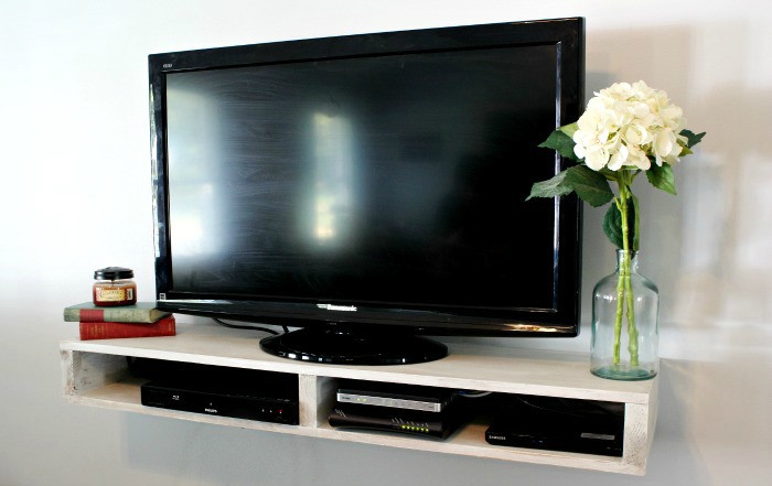 How to Build a Simple Floating TV Shelf with just enough storage!