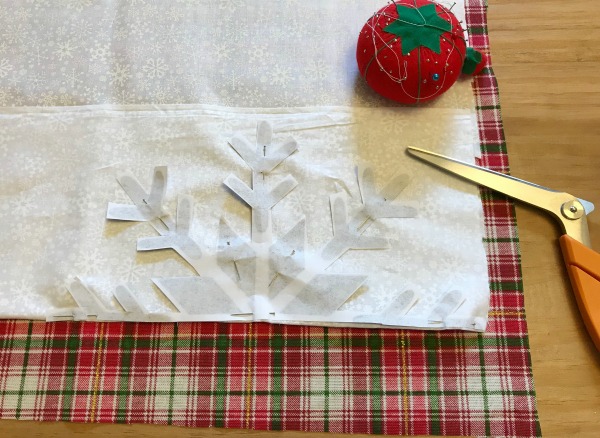 How to make a DIY snowflake pillow with a paper template