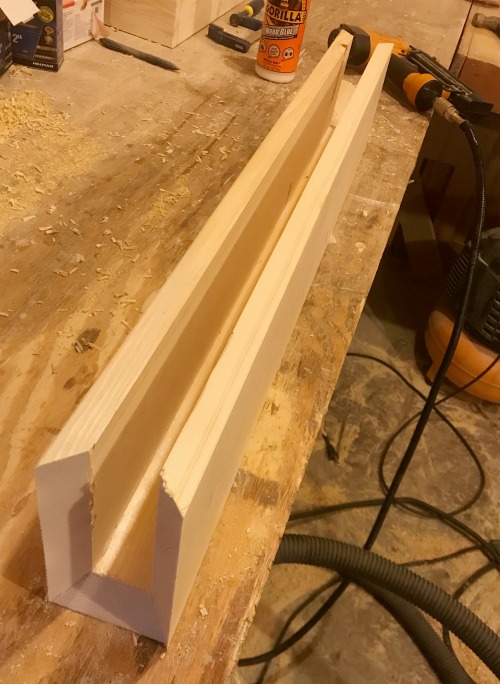 Top, front and bottom floating shelf boards glued and nailed together