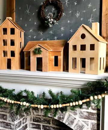 DIY Wooden Christmas Village Display perfect for a simple Scandinavian Christmas Mantle