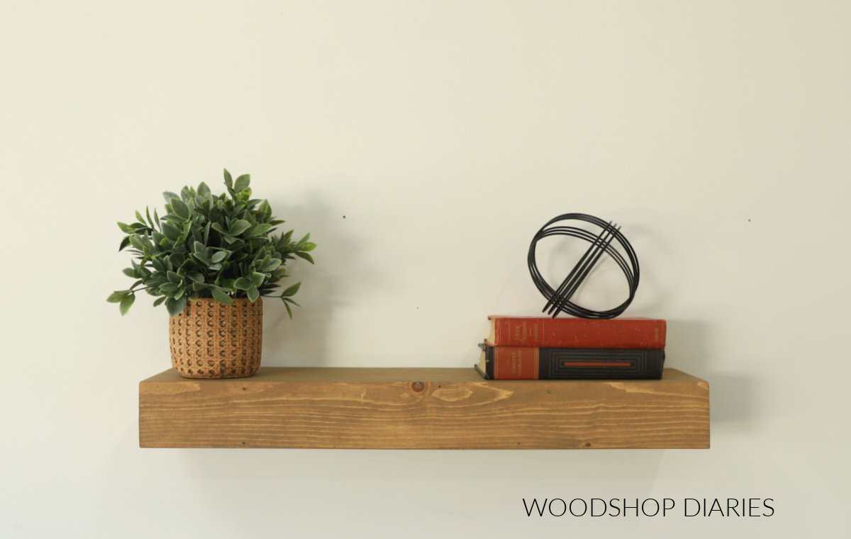 Chunky wooden floating shelf with mitered corners so it looks seamless