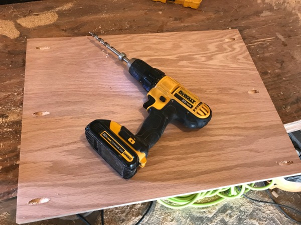 drill pocket holes into the bottom of the DIy shelf cabinet carcass