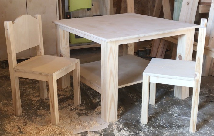 Wooden kids table and chair set unfinished in workshop