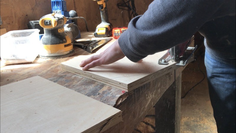 Using a jig saw to cut curve on wooden backs for kids chairs