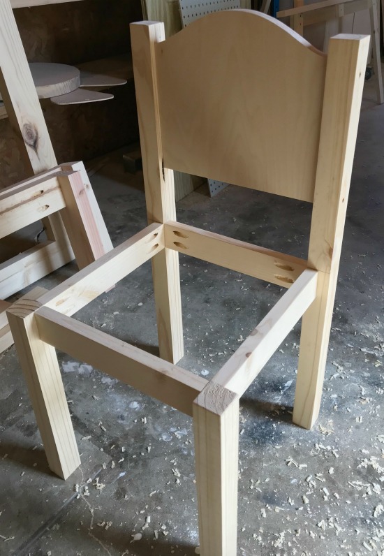 Wooden childrens seat frame assembled in workshop