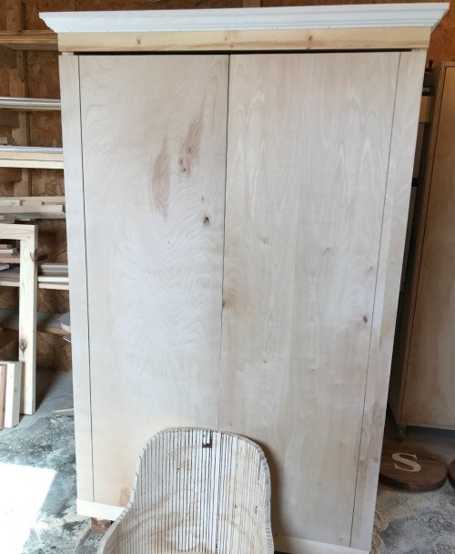 Plywood doors test fit onto armoire cabinet with dadoes cut for "faux face frame"