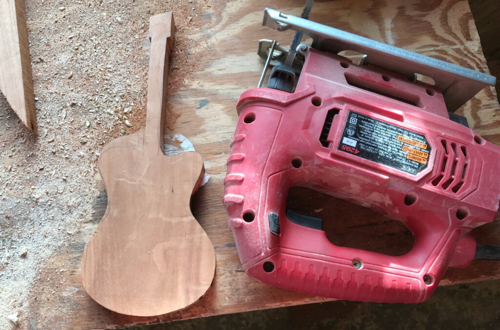 Scrap wood guitar cut out for bookends