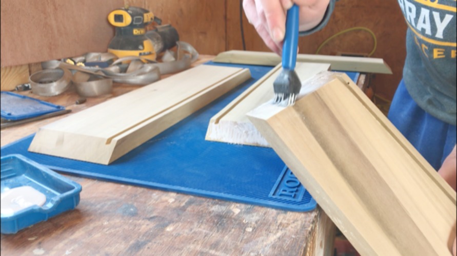 applying glue to mitered keepsake box corners