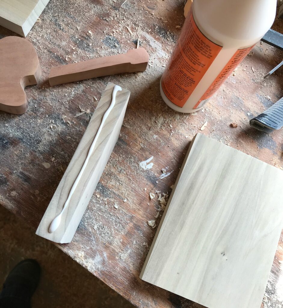 Apply glue to attach book end pieces