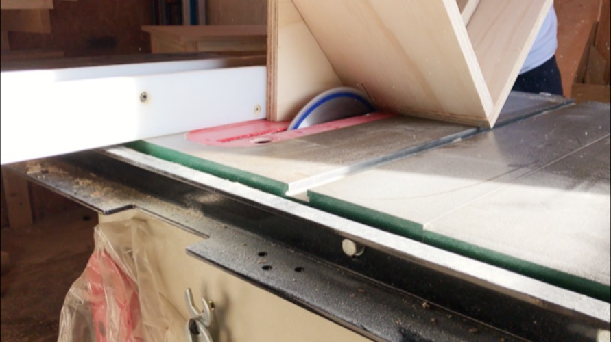 Spline jig running through table saw