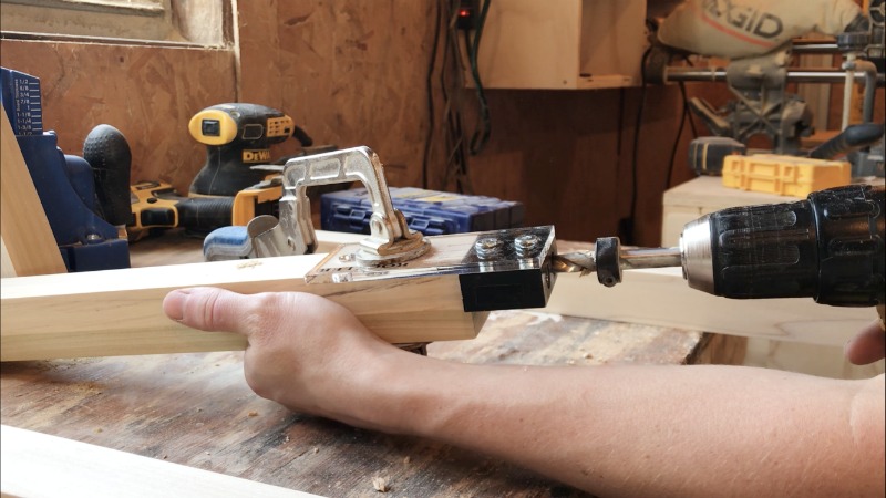 Drill dowel holes into end of frame pieces for modern nightstand assembly