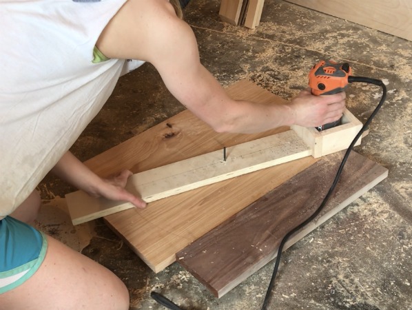 using a shop made router and circle jig to cut wood clock