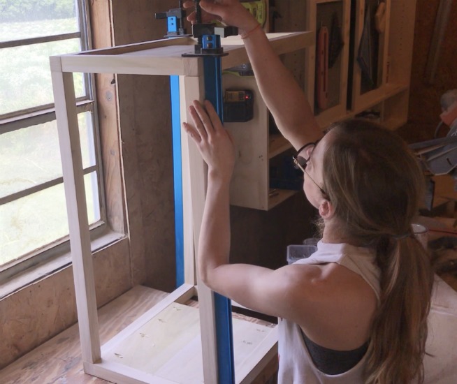 Clamp nightstand frame together while glue dries