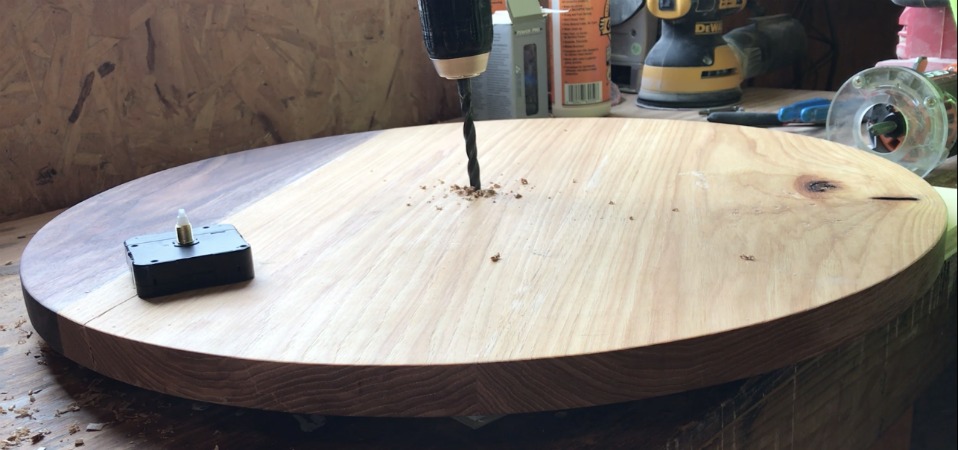Drilling hole in center of round wood piece