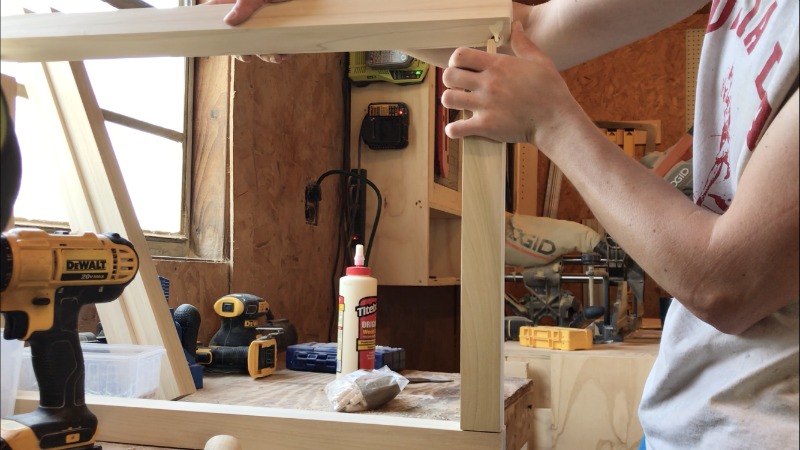 Glue together modern nightstand frame using dowels